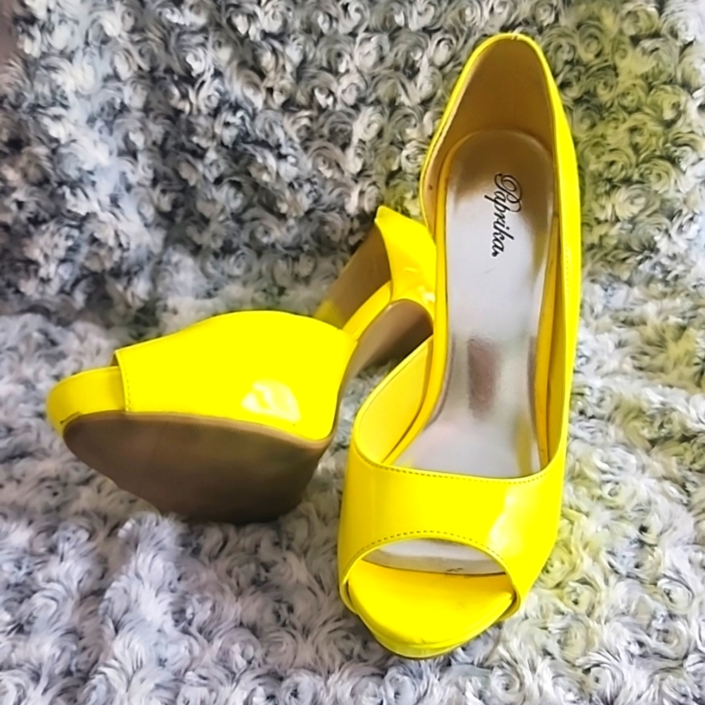 Bright yellow pumps